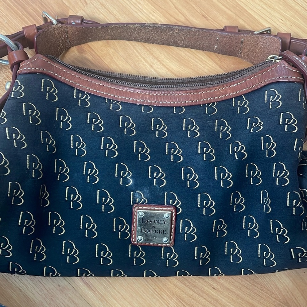Dooney and Bourke Original design mid sized handbag